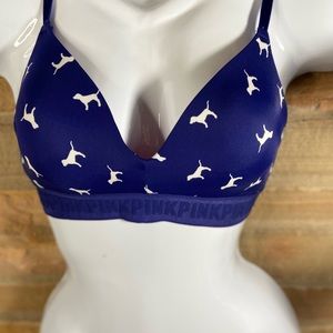 Pink Victoria’s Secret Wear Everywhere wireless bra. Navy blue w/ white dogs.32D